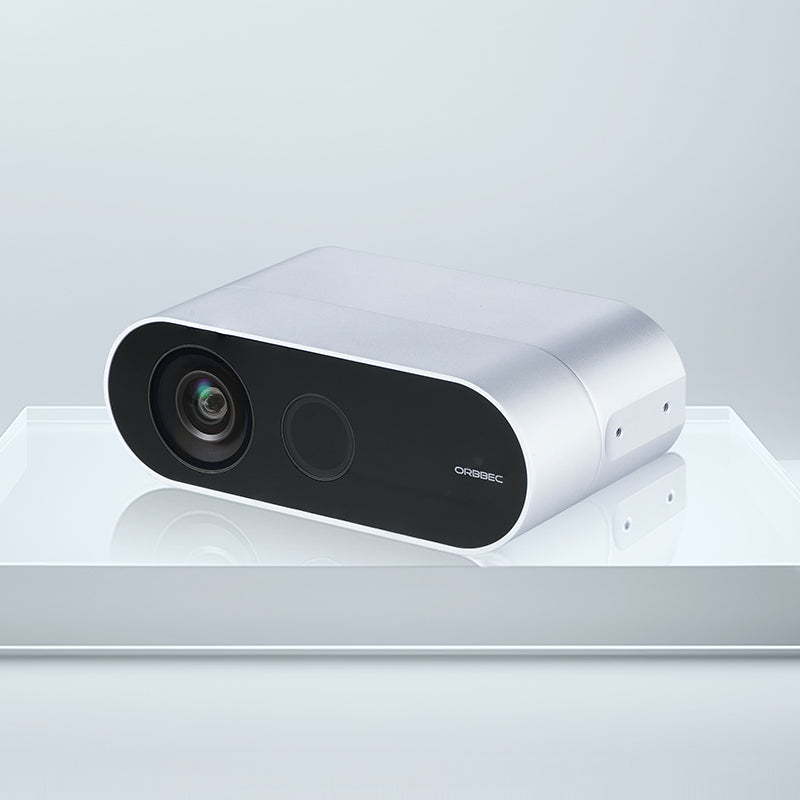 Angled promotional view of compact Orbbec Femto Bolt iToF camera, a recommended Azure Kinect alternative.