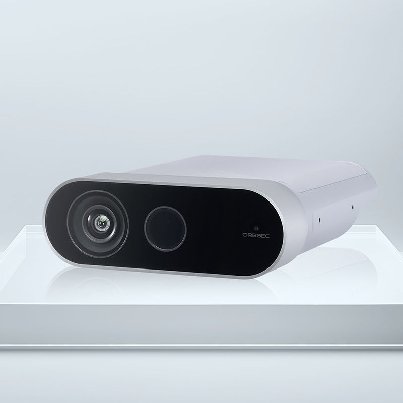 Angled promotional view of Orbbec Femto Mega 3D camera built on NVIDIA Jetson for real-time Ethernet streaming.