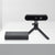 Front view of Orbbec Gemini 2 XL 3D camera on a mini tripod placed alongside the sleek black OBox PoE adapter.