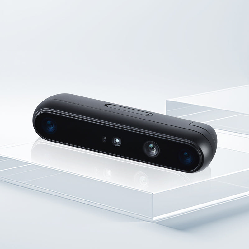 Angled product photo of Gemini 335Lg 3D camera featuring dual global shutter sensors for anti-blur imaging.